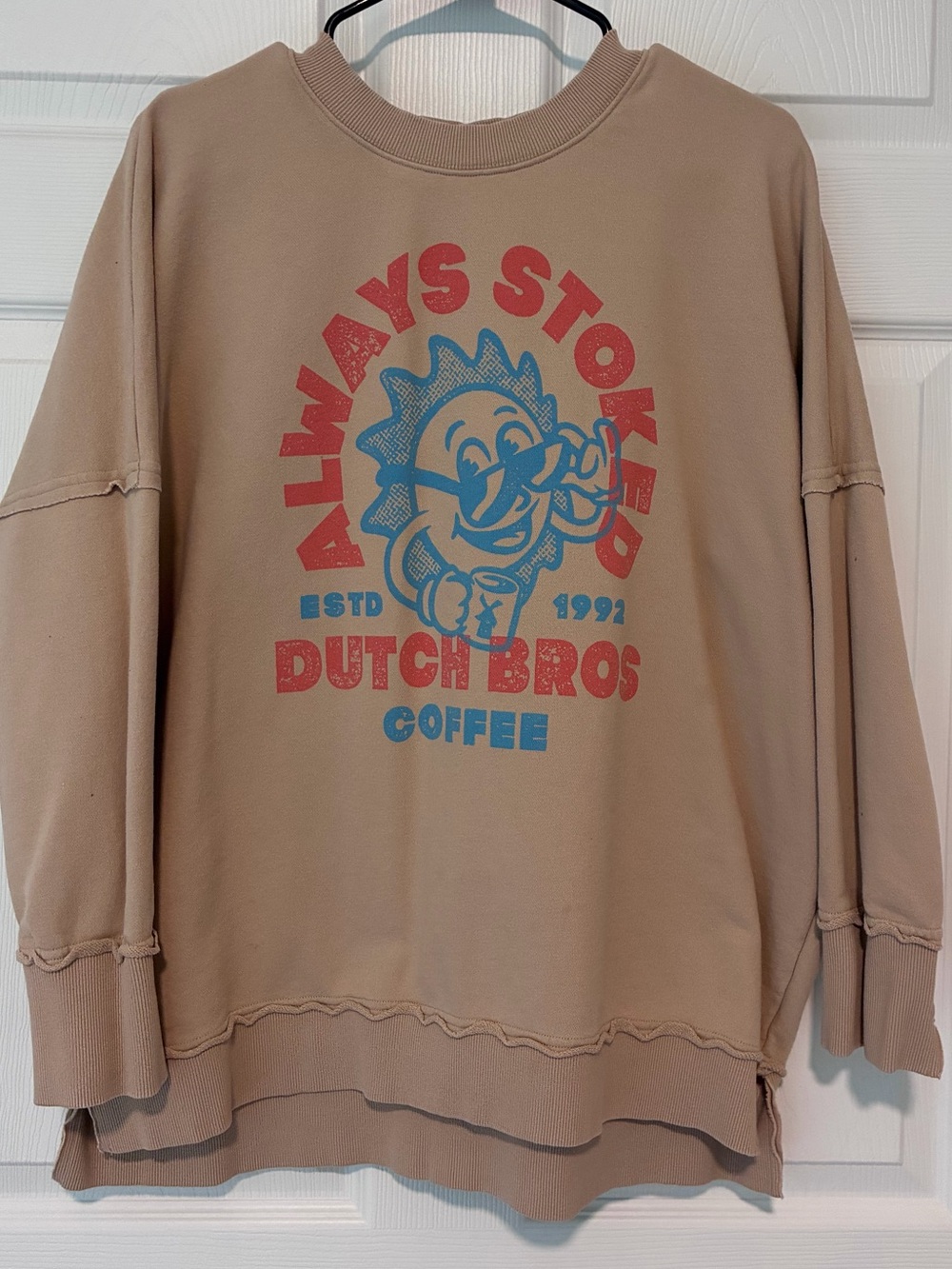 Dutch Bros Beige Crewneck with Red and Blue Graphic